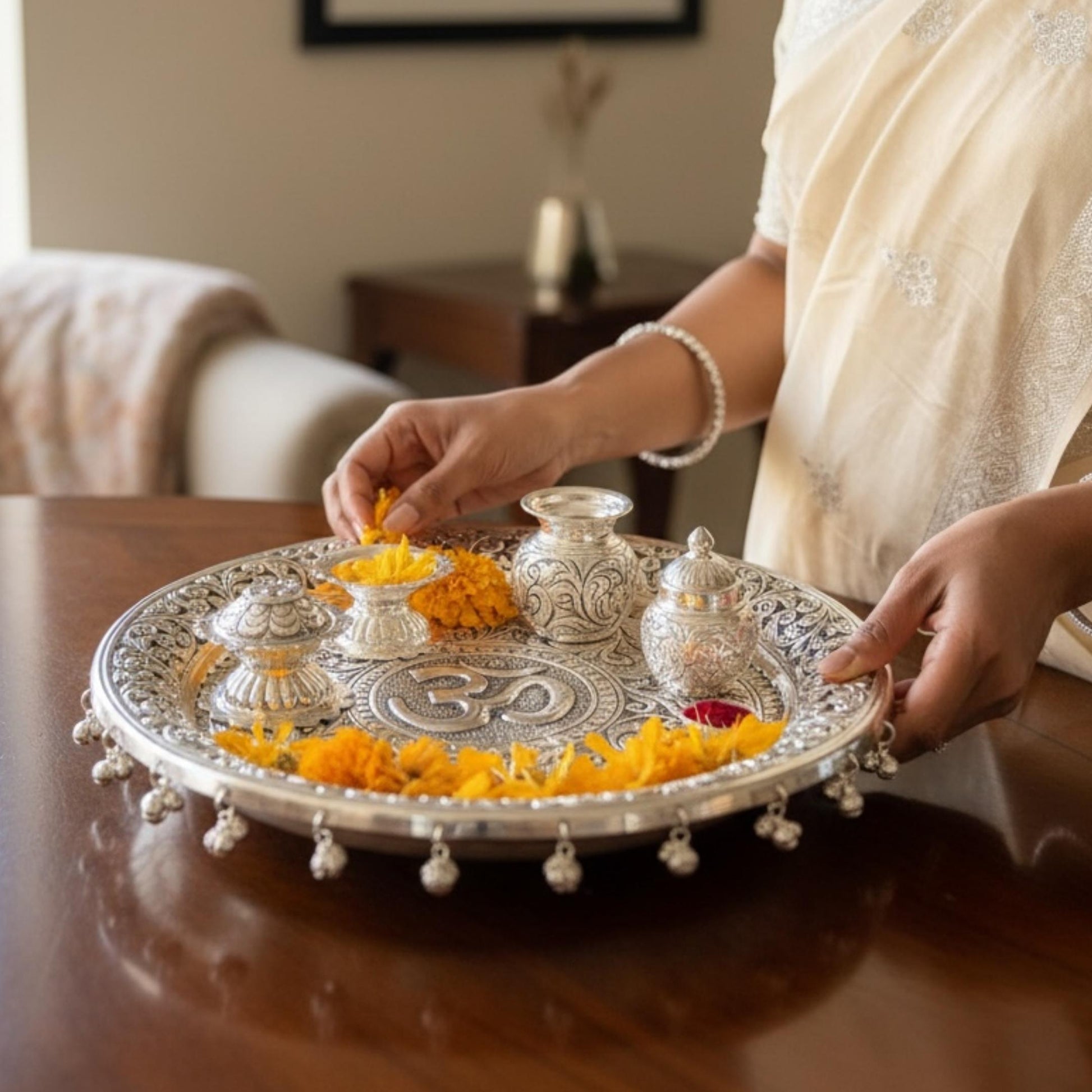 An 11-inch German Silver Om Pooja Thali Set featuring intricate hand-engraved designs, ideal for Laxmi Pujan rituals