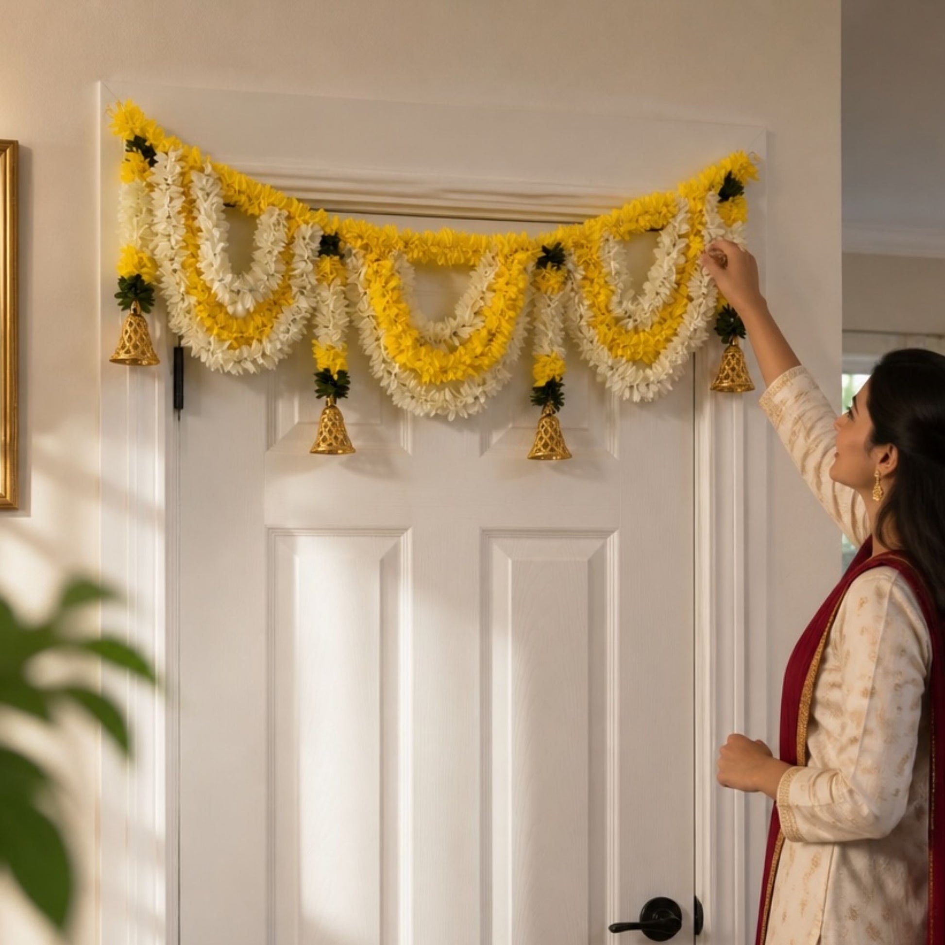 Champa yellow-white layered marigold toran bandhanwar with gold bells