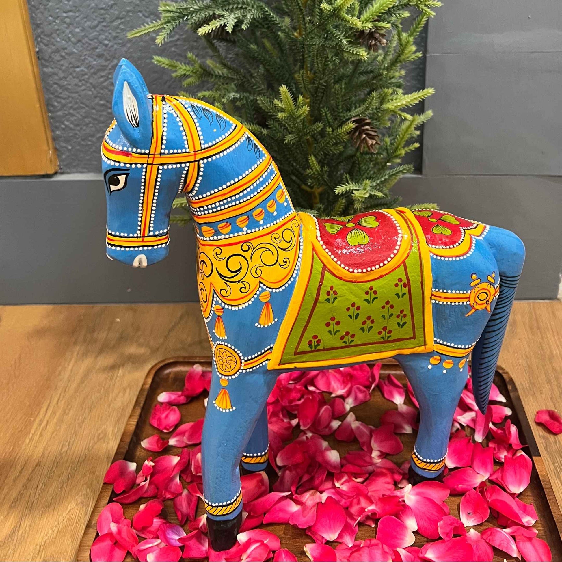 Handcrafted 12-inch wooden horse, ideal for ethnic or boho decor themes.