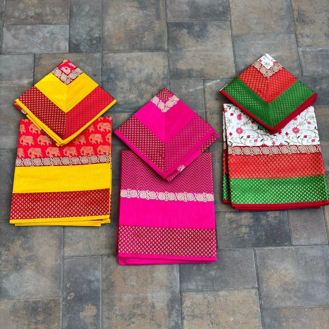 Banarasi brocade pooja aasan set — Pink Zigzag, Yellow Elephant, Green Floral in folded settings
