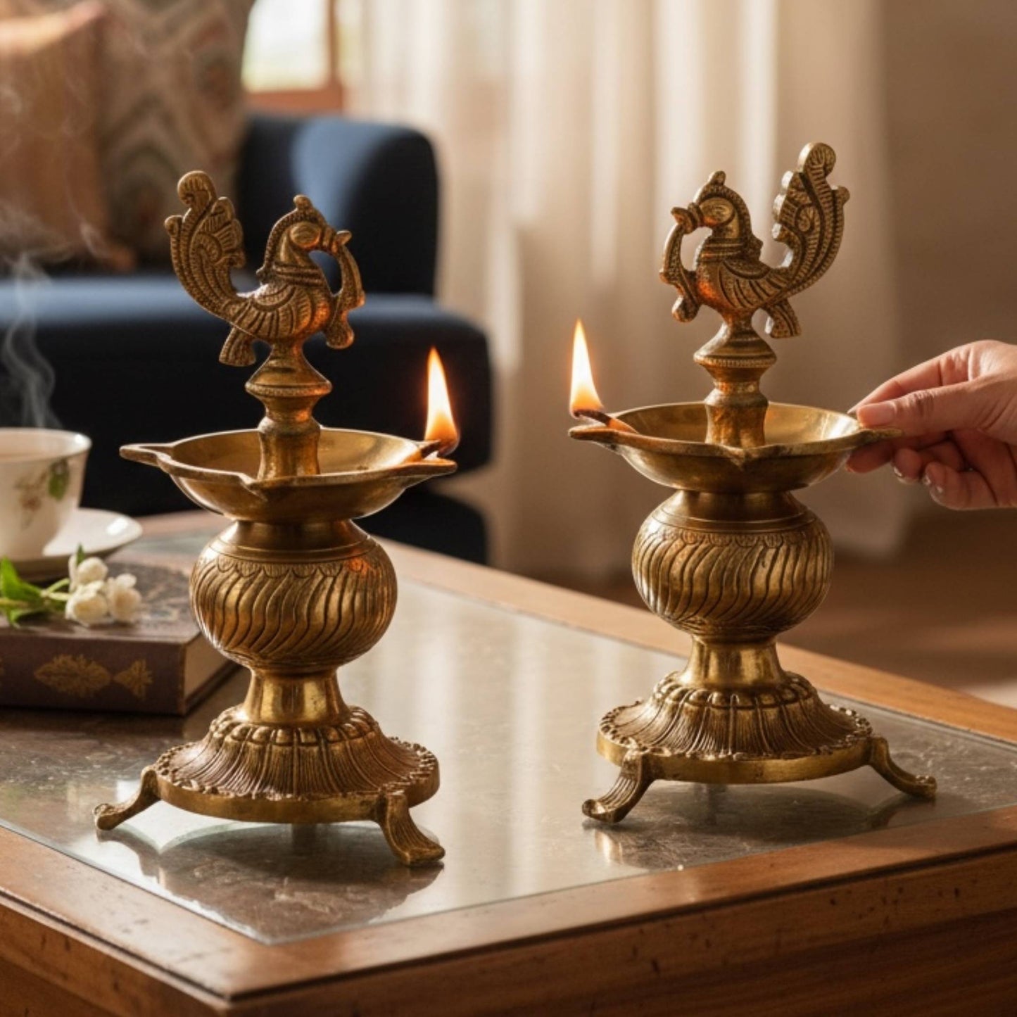 Traditional South Indian brass Kuthu Vilakku styled for a housewarming gift or Diwali mandir decor – Elegant Annam bird lamp for daily pooja rituals.