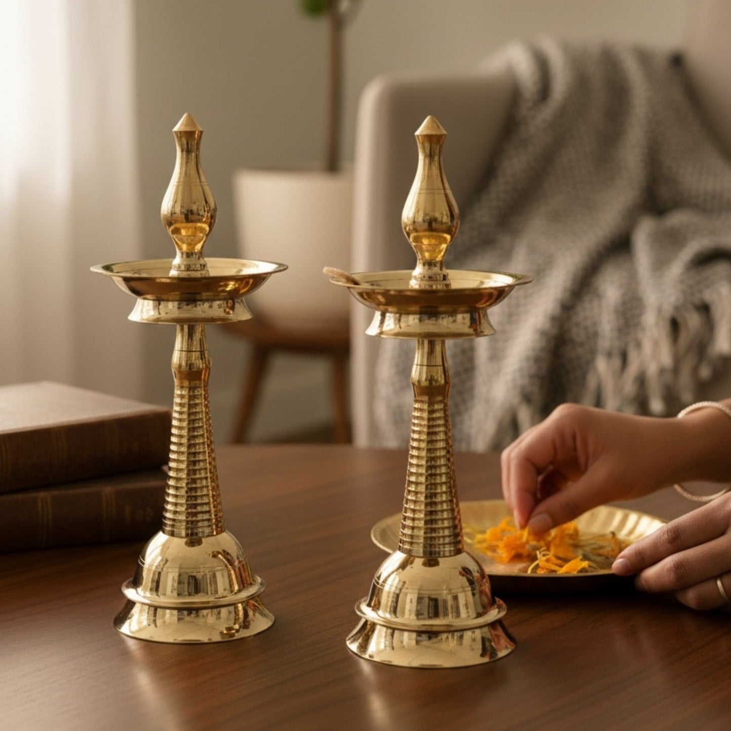 Set of 2 Kerala Diya lamps lit with cotton wicks for a spiritual ambiance – Handcrafted brass Kuthu Vilakku for everyday pooja rituals.