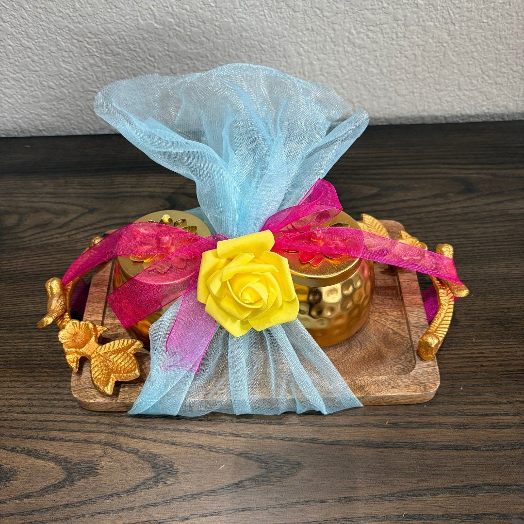 Decorative copper jar gift set on wooden tray with yellow rose and pink ribbons — Premium Indian Gifting Set