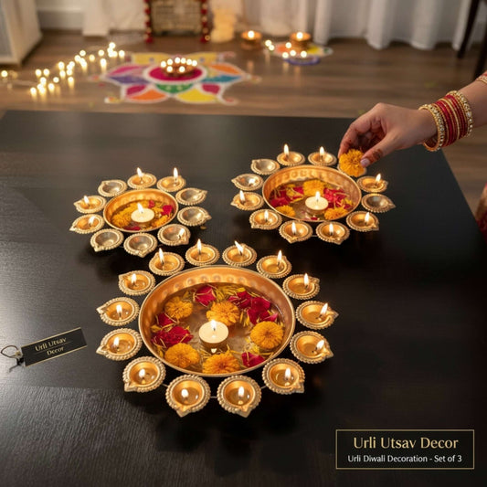 Urli Utsav Decor popular diya urli set with floating candles and marigolds for Diwali.