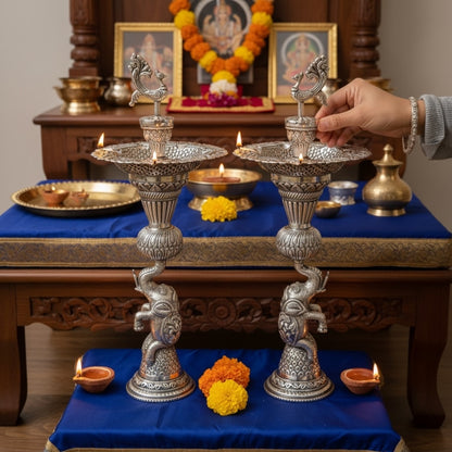 Ceremonial lighting of German silver antique silver samai oil lamp with peacock and elephant base