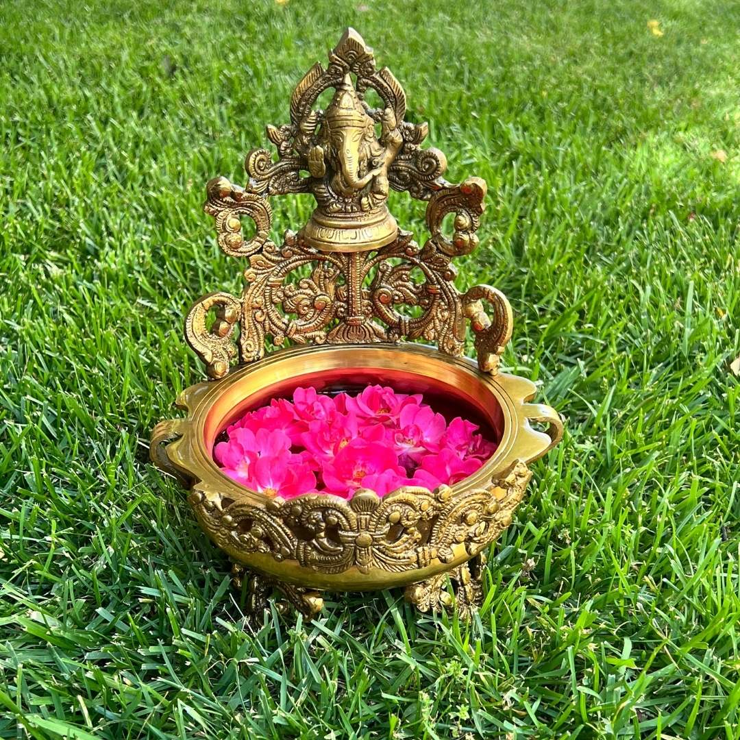 Elegant Brass Ganesha Urli Bowl with Lord Ganesha idol on rim