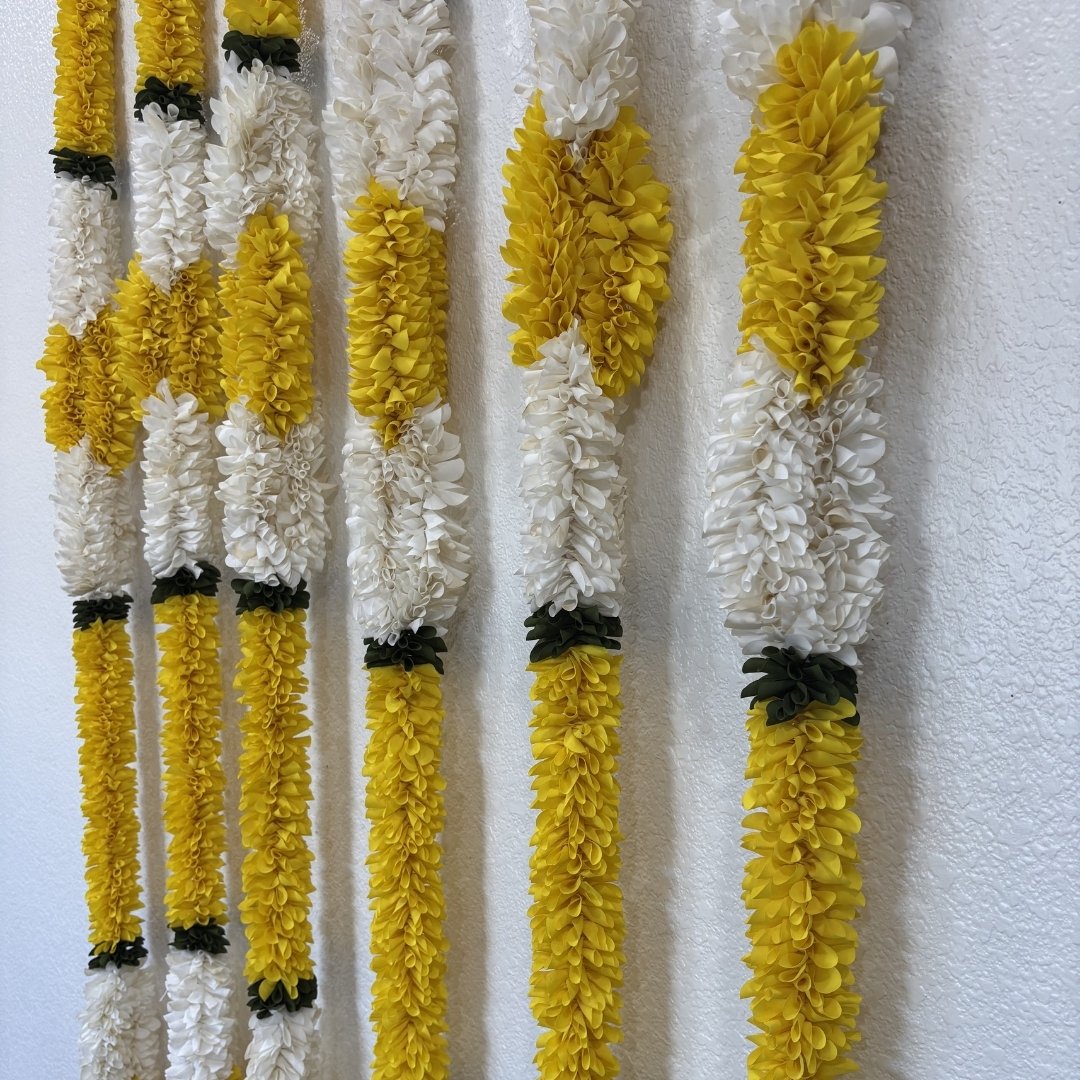 Set of 6 yellow white fabric garlands hung on wall Indian home Diwali decor
