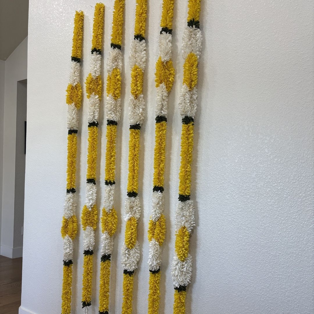 Yellow marigold white jasmine fabric garlands close-up Indian festive decor set of 6