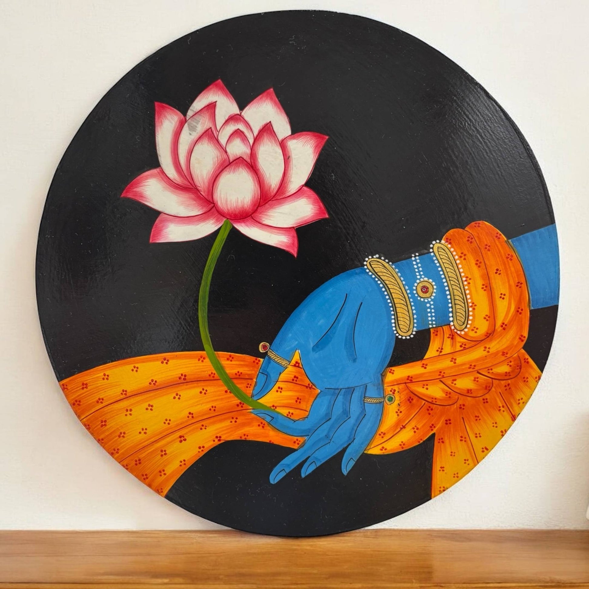 Handpainted lotus wall plate featuring a detailed and colorful depiction of the lotus flower, a symbol of purity and beauty in Indian culture