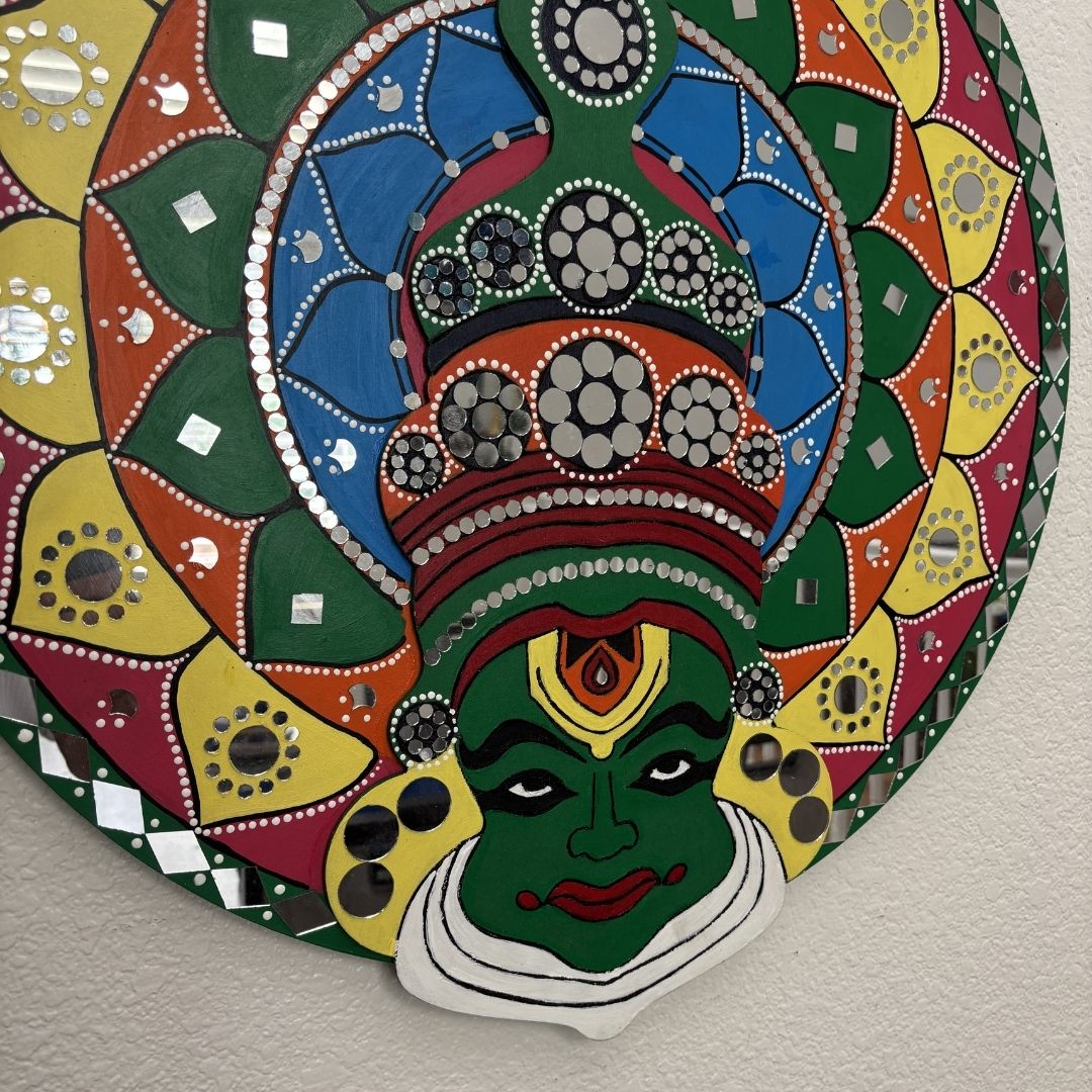 close up of 24 inches round Kathakali wall art by urli utsav decor