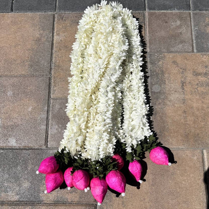 2-foot white jasmine and pink lotus bud fabric garland on stone surface – handmade artificial Indian garland with sola wood buds and faux pearls