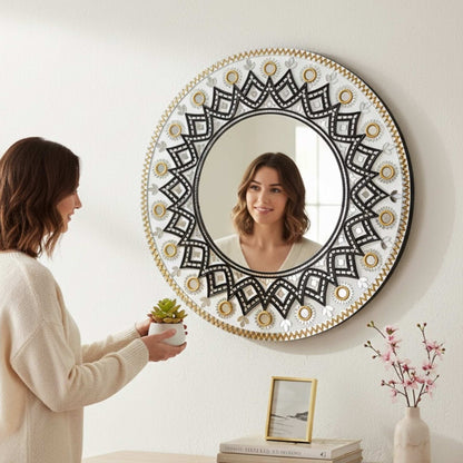 Woman Holding Succulent Plant Next to 24-Inch Black and Gold Mandala Lippan Mirror – Handcrafted Indian Wall Art for Living Room or Entryway Decor