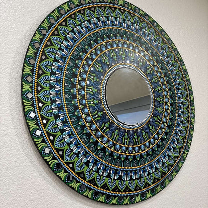 Hawaii Rainforest mandala mirror hung on a pale wall, showing its three-foot scale