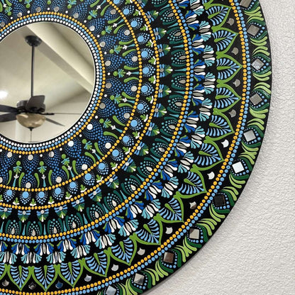 Hawaii Rainforest mandala mirror above a white fireplace mantel in a bright room