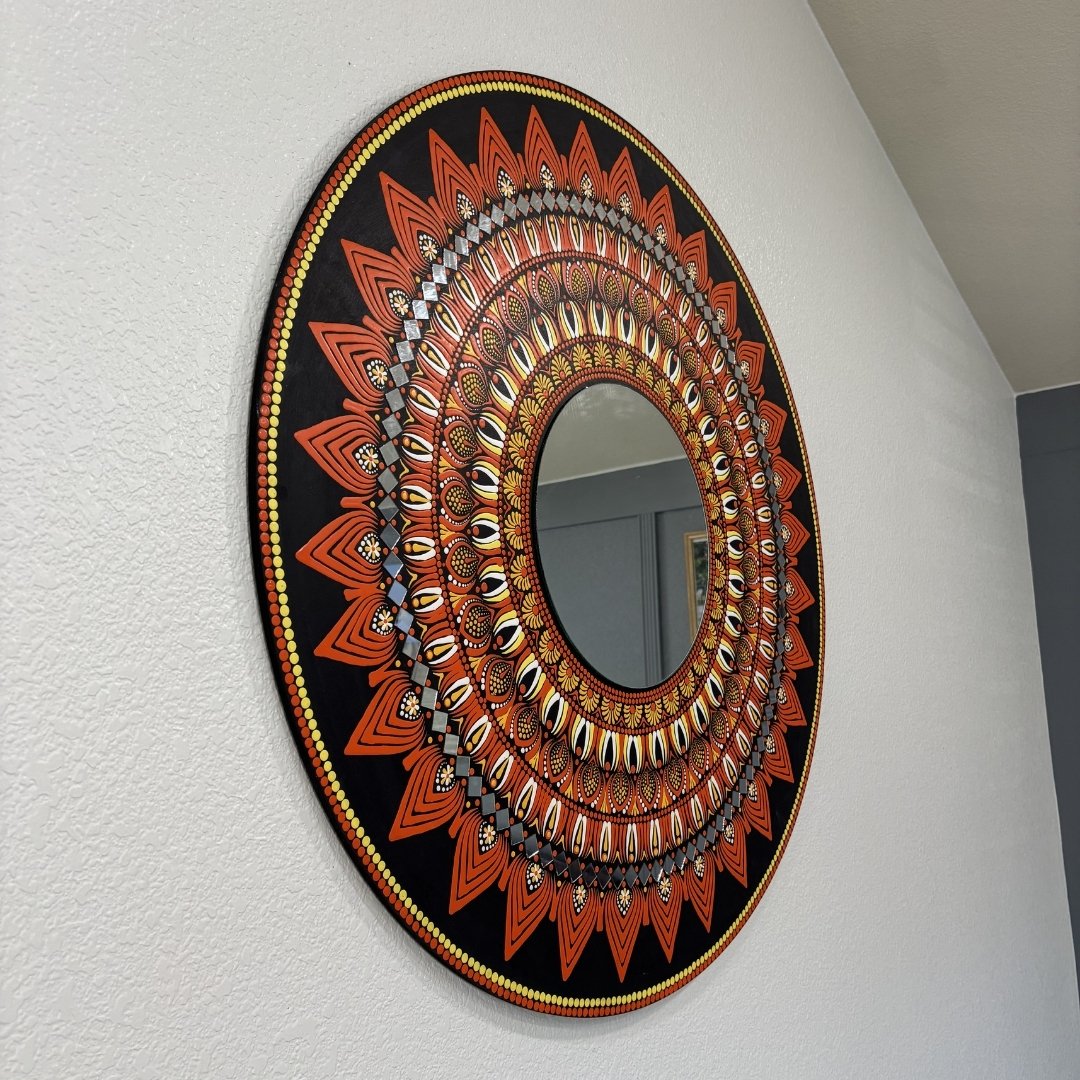 Circular mandala-style wall mirror with detailed hand-painted design