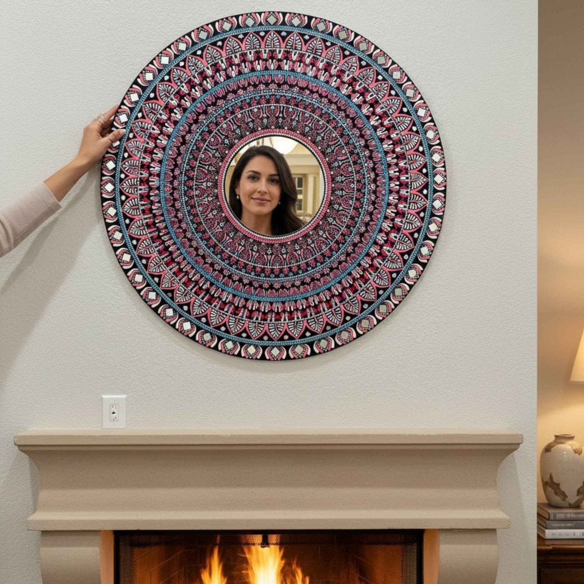 Colorful mandala mirror wall art displayed above a fireplace mantel for home decor 