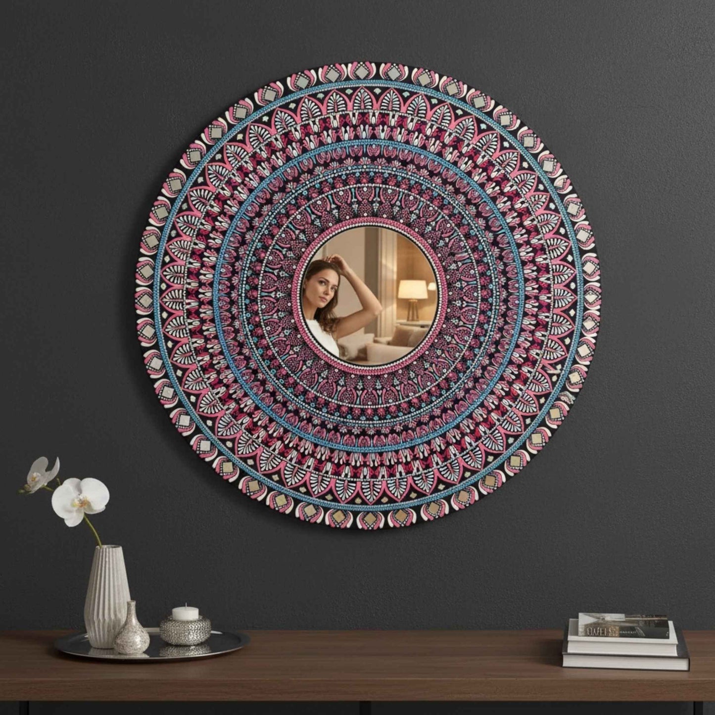 Intricate mandala mirror wall art mounted on dark wall above wooden furniture