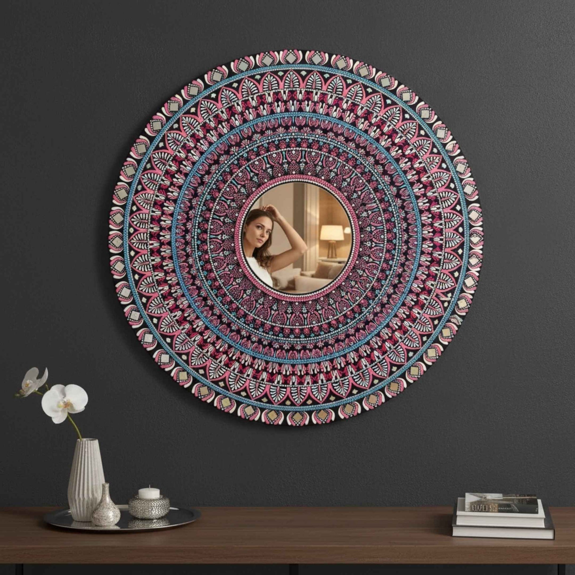 Intricate mandala mirror wall art mounted on dark wall above wooden furniture