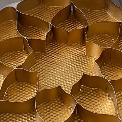 Gold honeycomb pattern closer look of etching plate urli