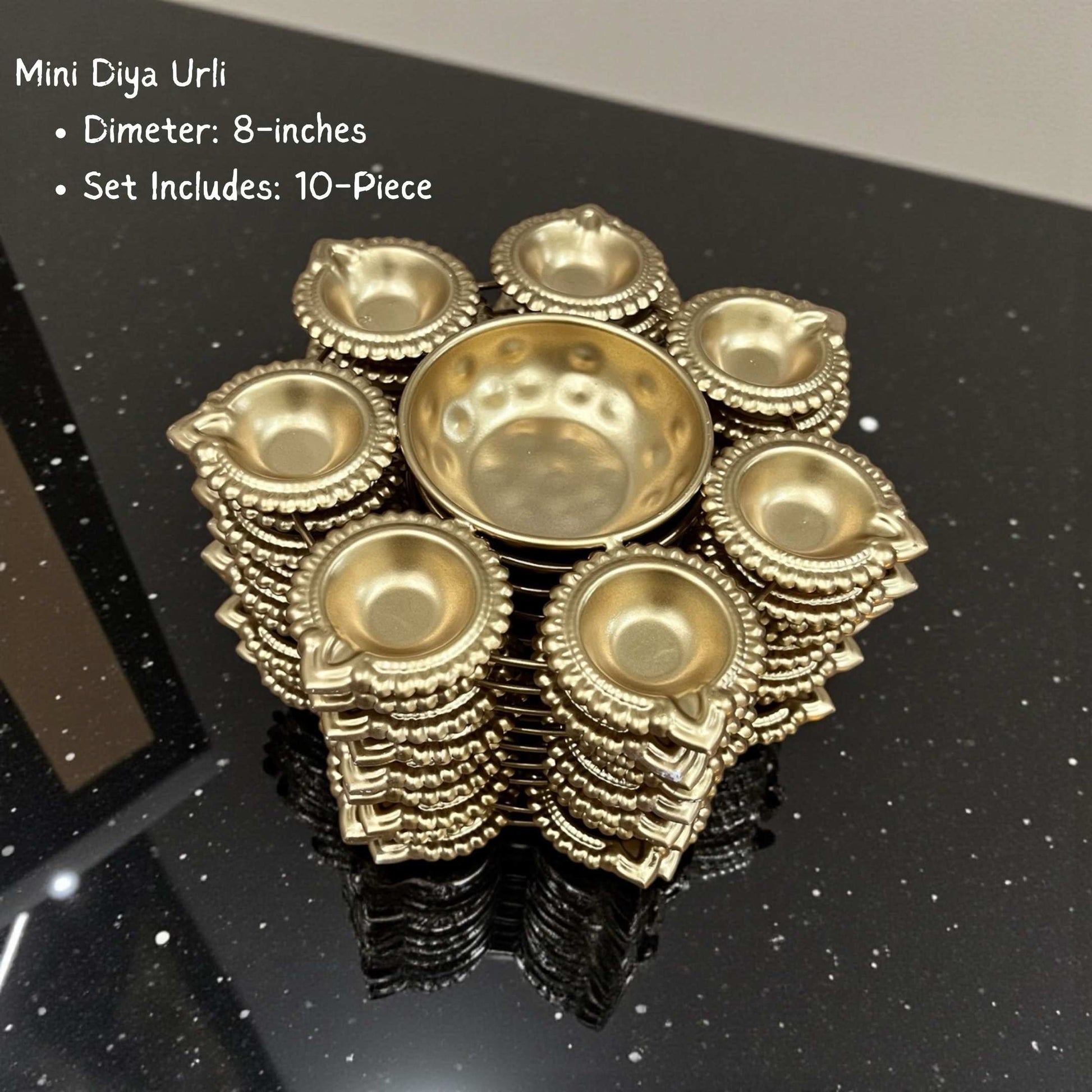 Set of 10 handcrafted gold hammered mini Diya Urli bowls for Indian festive decor.