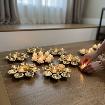 Handcrafted iron metal Urli bowls in a set of 10 for desi wedding favors and mehndi giveaways.