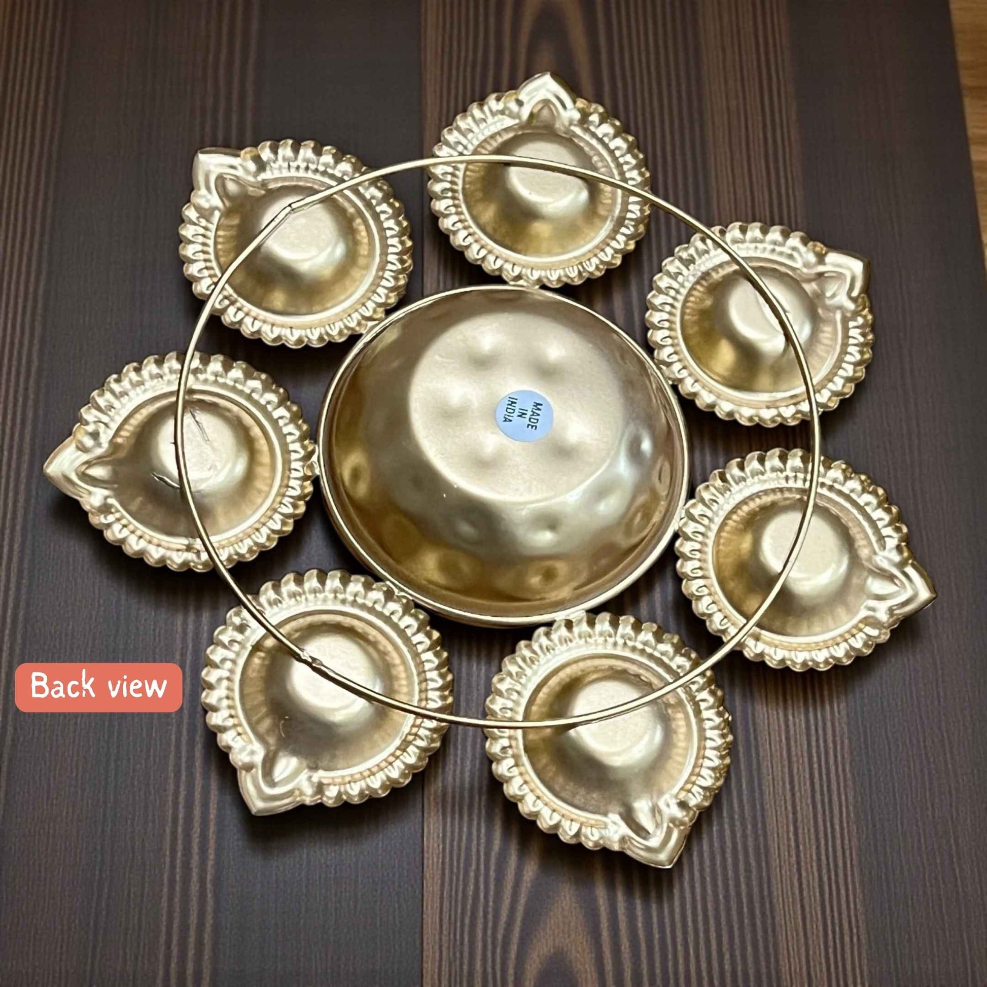 Durable iron metal gold Urli with a premium finish, handcrafted in India for ethnic gifting.