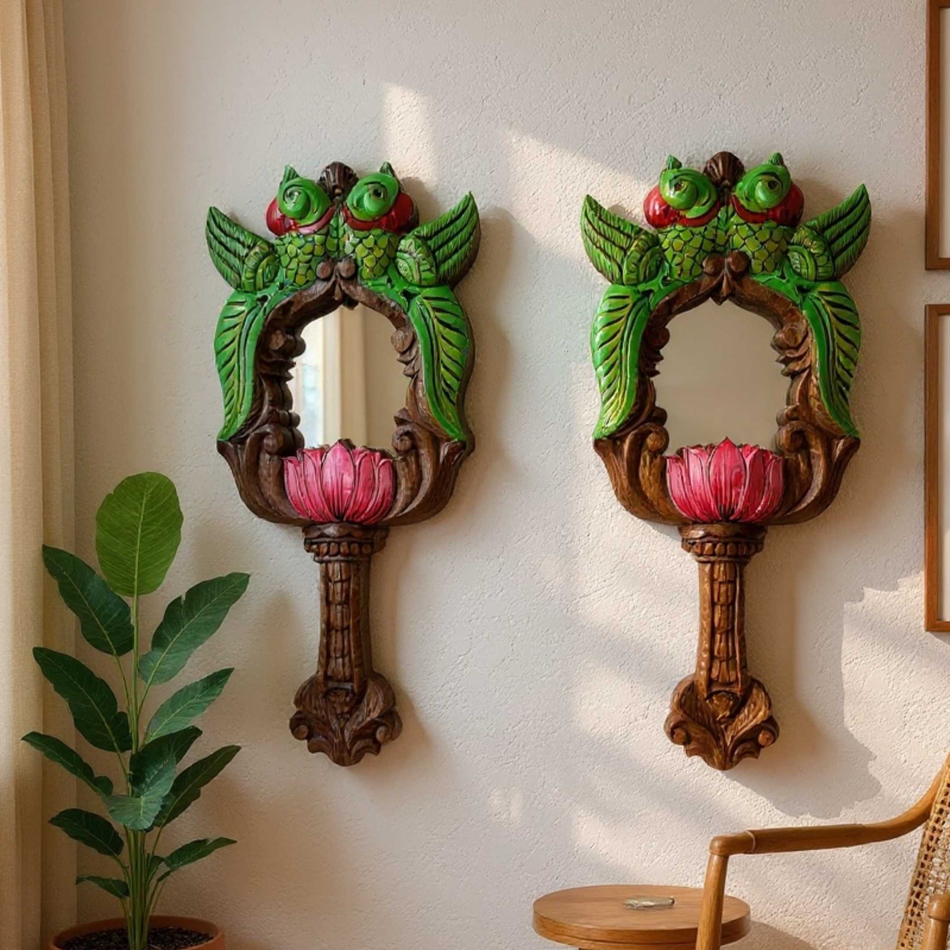 Set of 2 hand-carved green parrot lotus wooden mirrors on cream wall – Indian home decor