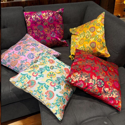 Set of 5 colorful Indian brocade pillows adding ethnic elegance to a contemporary home interior
