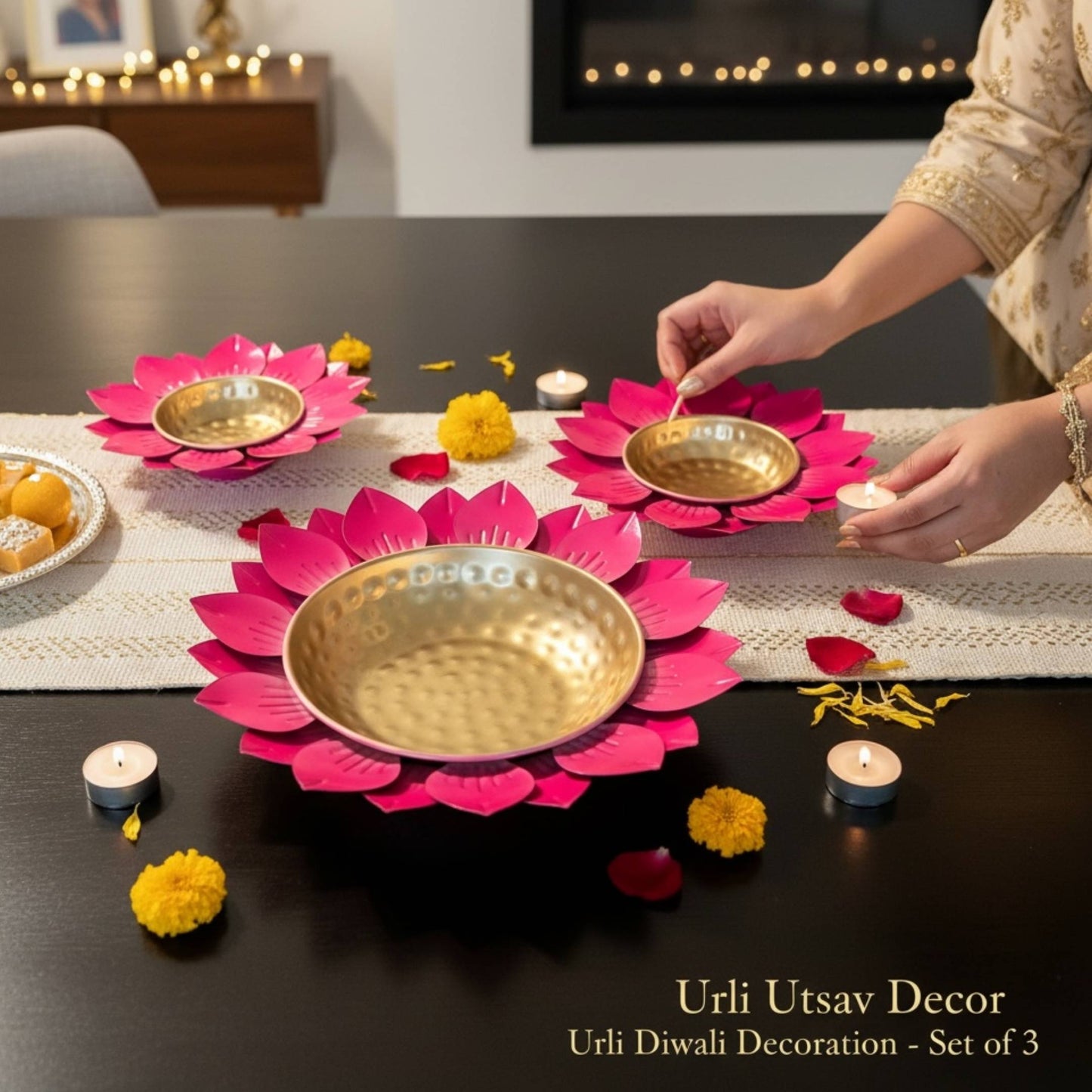 Diwali Decorative setup with Sunflower Pink Urli Bowls and candles on a table, featuring Urili Utsav Decor product.