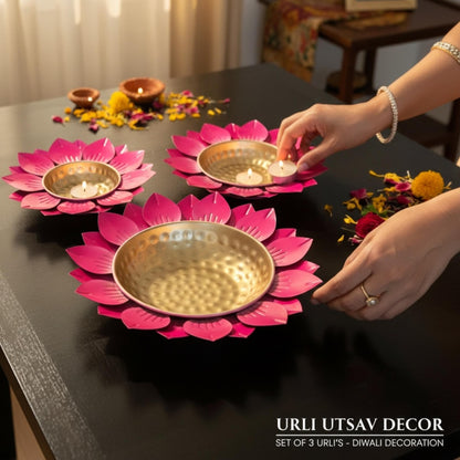Diwali Decorative setup with Sunflower Pink Urli Bowls and candles on a table, featuring Urili Utsav Decor product.