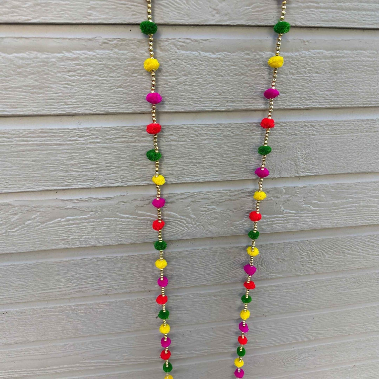 Handcrafted woolen pompom garland with gold beads, reusable Indian festive string
