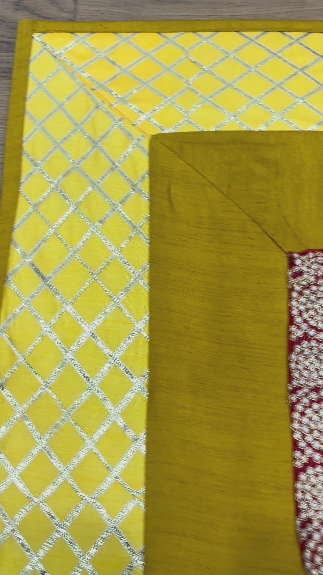 Puja Aasan Mat in three design choices – Emerald Lattice with green center and red lattice border, Golden Maroon Classic with maroon patterned center and yellow lattice border, and Elephant Regal with maroon elephant motif and red lattice border.