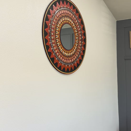 Video preview of 3ft round mandala mirror in black and orange colors