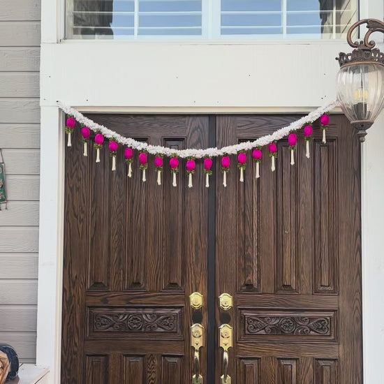 Video of Jasmine & Pink Bud Toran showing main door staging
