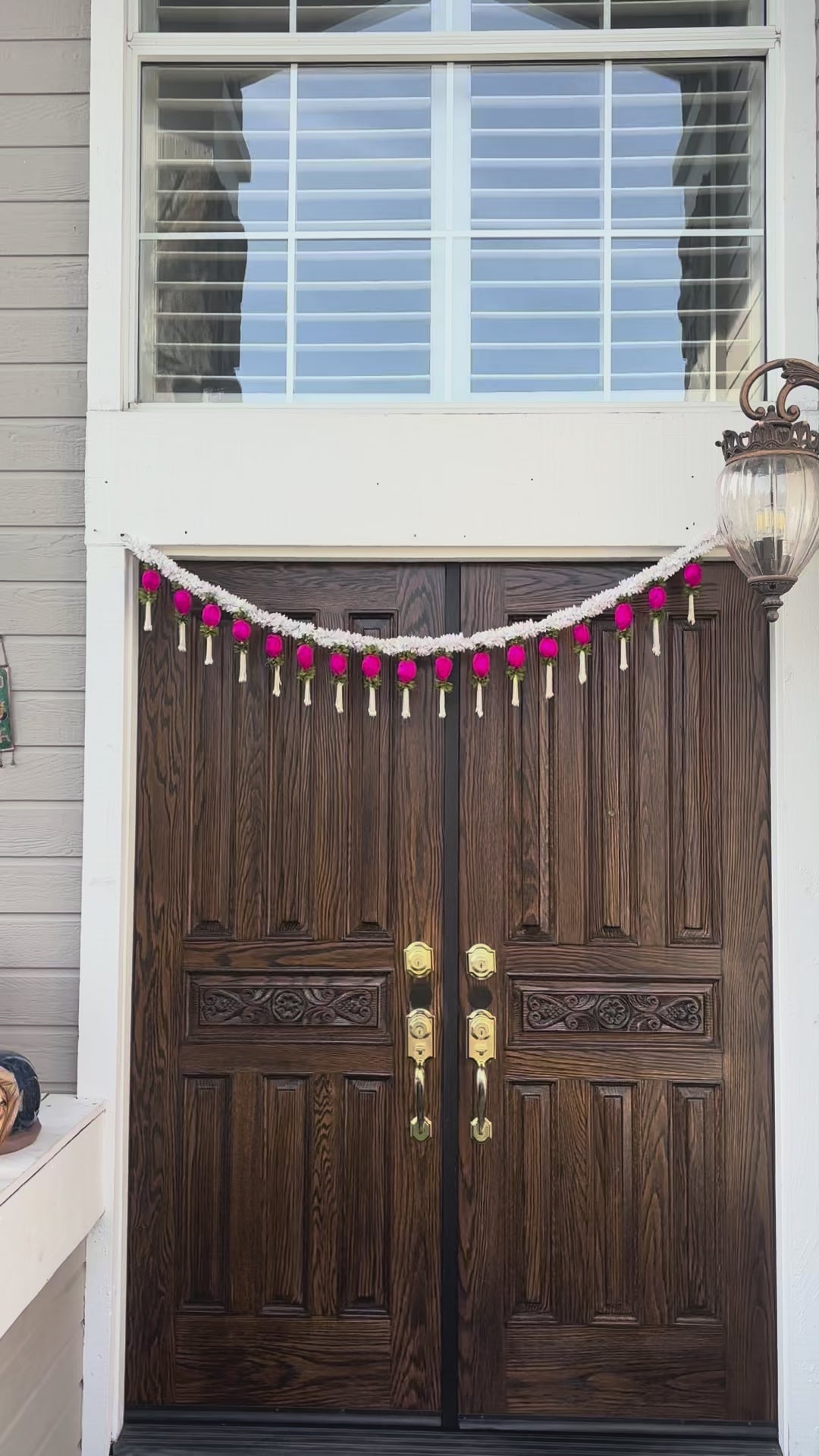 Video of Jasmine & Pink Bud Toran showing main door staging
