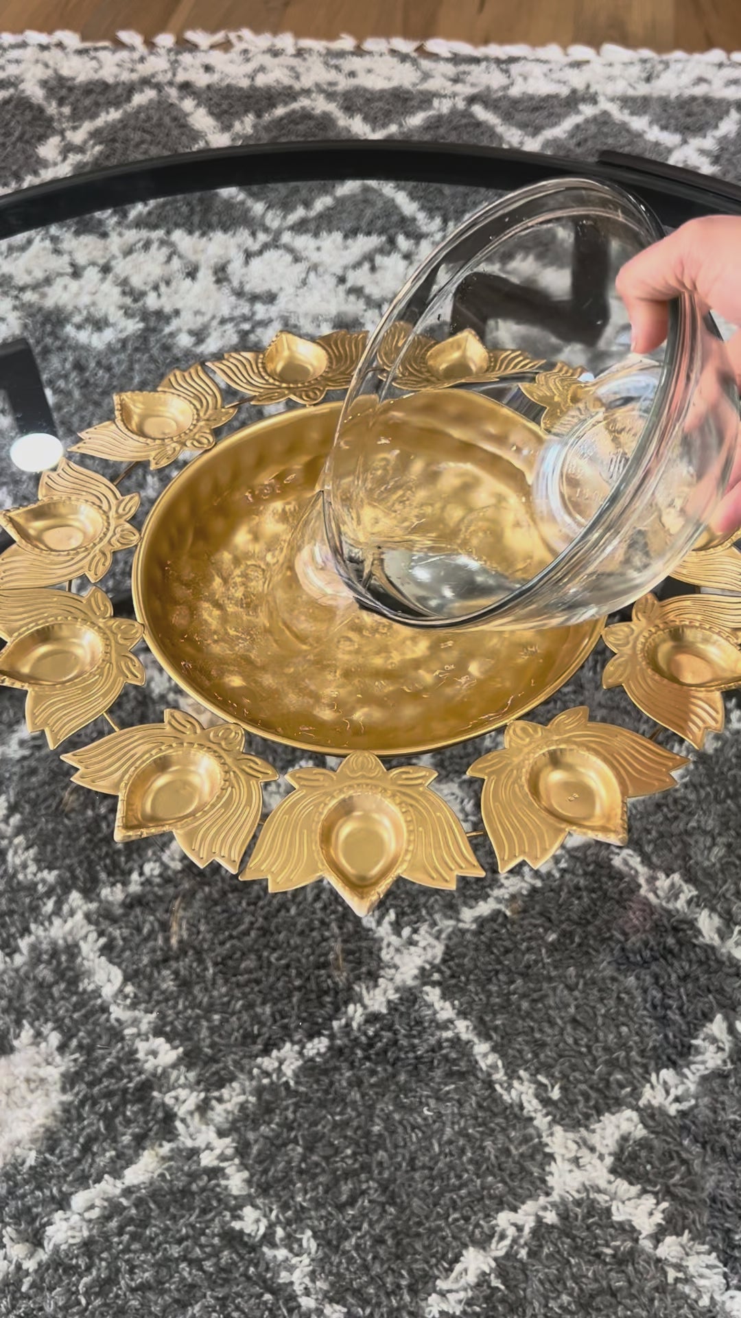 Short video showcasing the gold lotus urli set as a festive home entrance centerpiece.