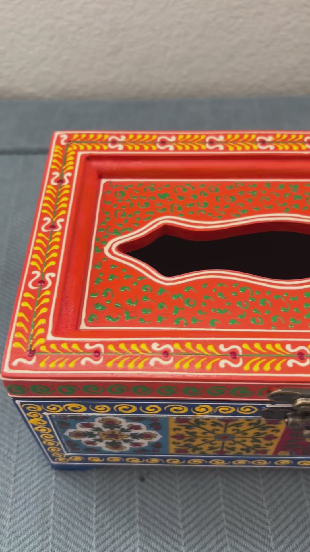 Video of Handcrafted mango wood tissue box with hand-painted Rajasthani floral art, brass latch & wooden feet.