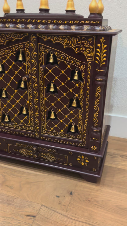 video of Urli Utsav 30×24×12 inches brown and gold wooden pooja mandir with hanging brass bells