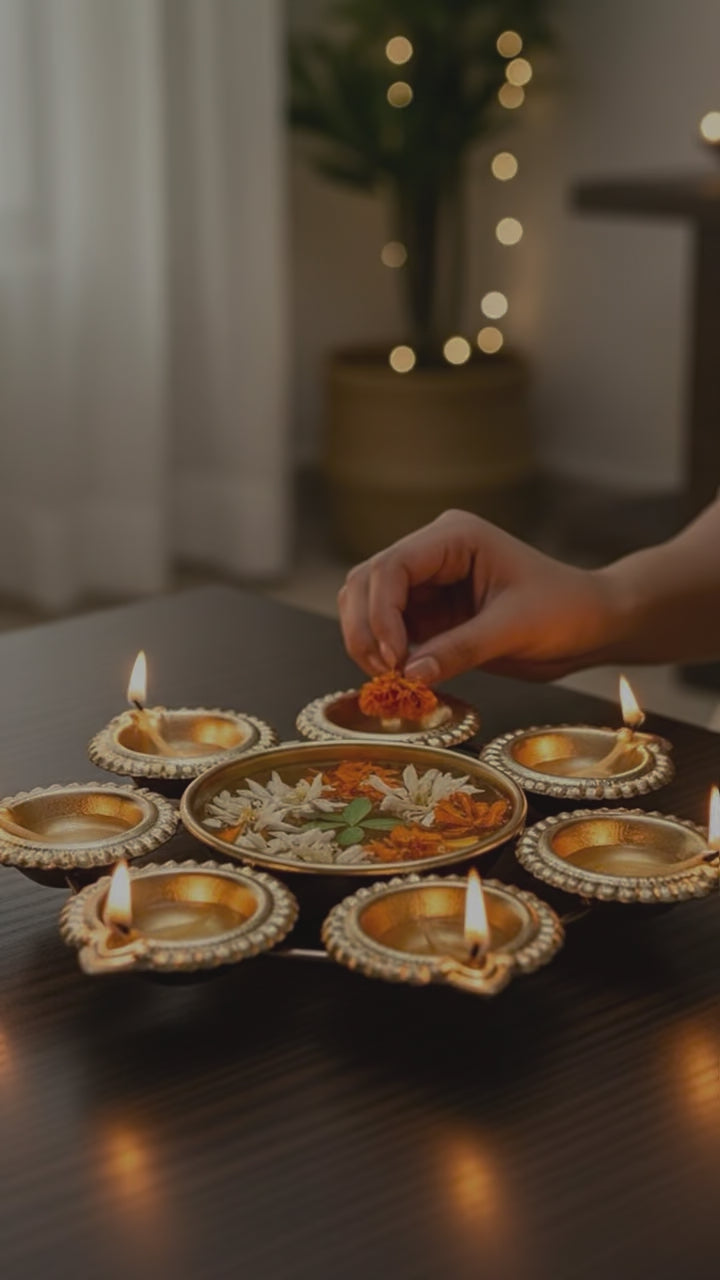 Video showcasing 8-inch diameter mini gold Urli bowl perfect for tabletop or pooja room display.