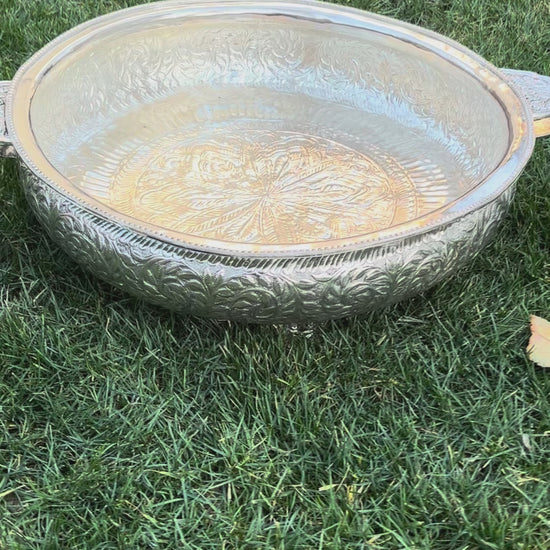 Video showing silver hand engraved 25 inch traditional urli bowl details and finish