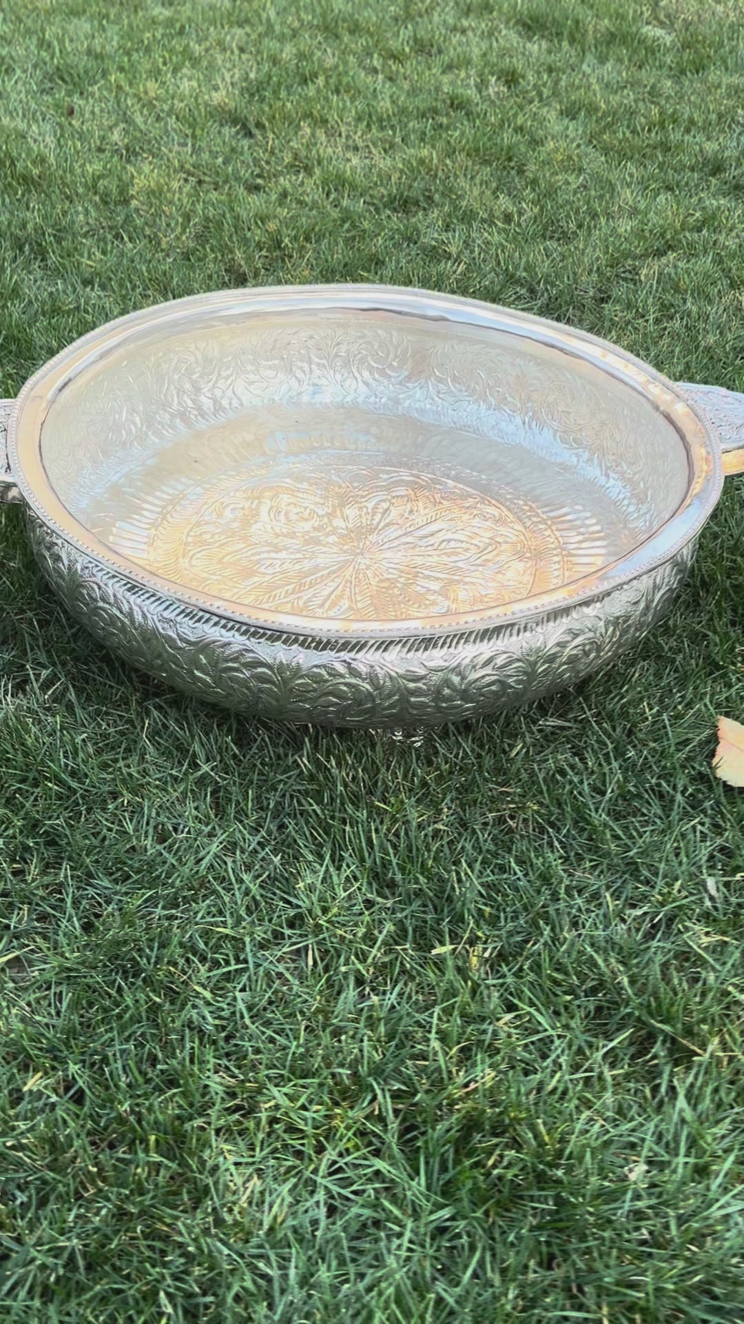 Video showing silver hand engraved 25 inch traditional urli bowl details and finish