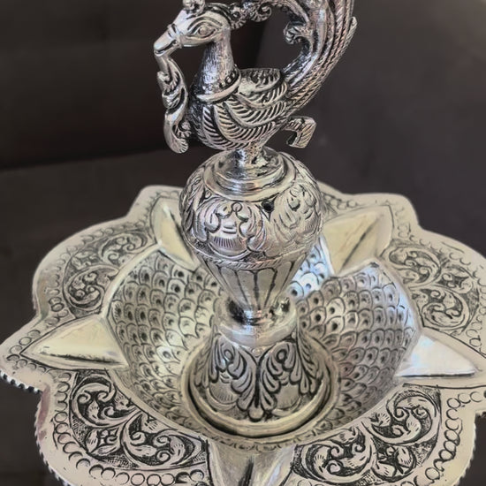 video of Decorative silver oil lamp by urli utsav decor