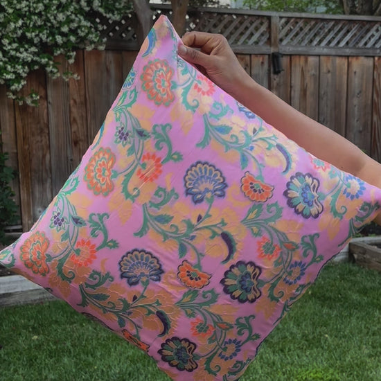 video show casing Stack of 5 premium silk brocade floral cushion covers, showcasing fabric quality and vibrant colors