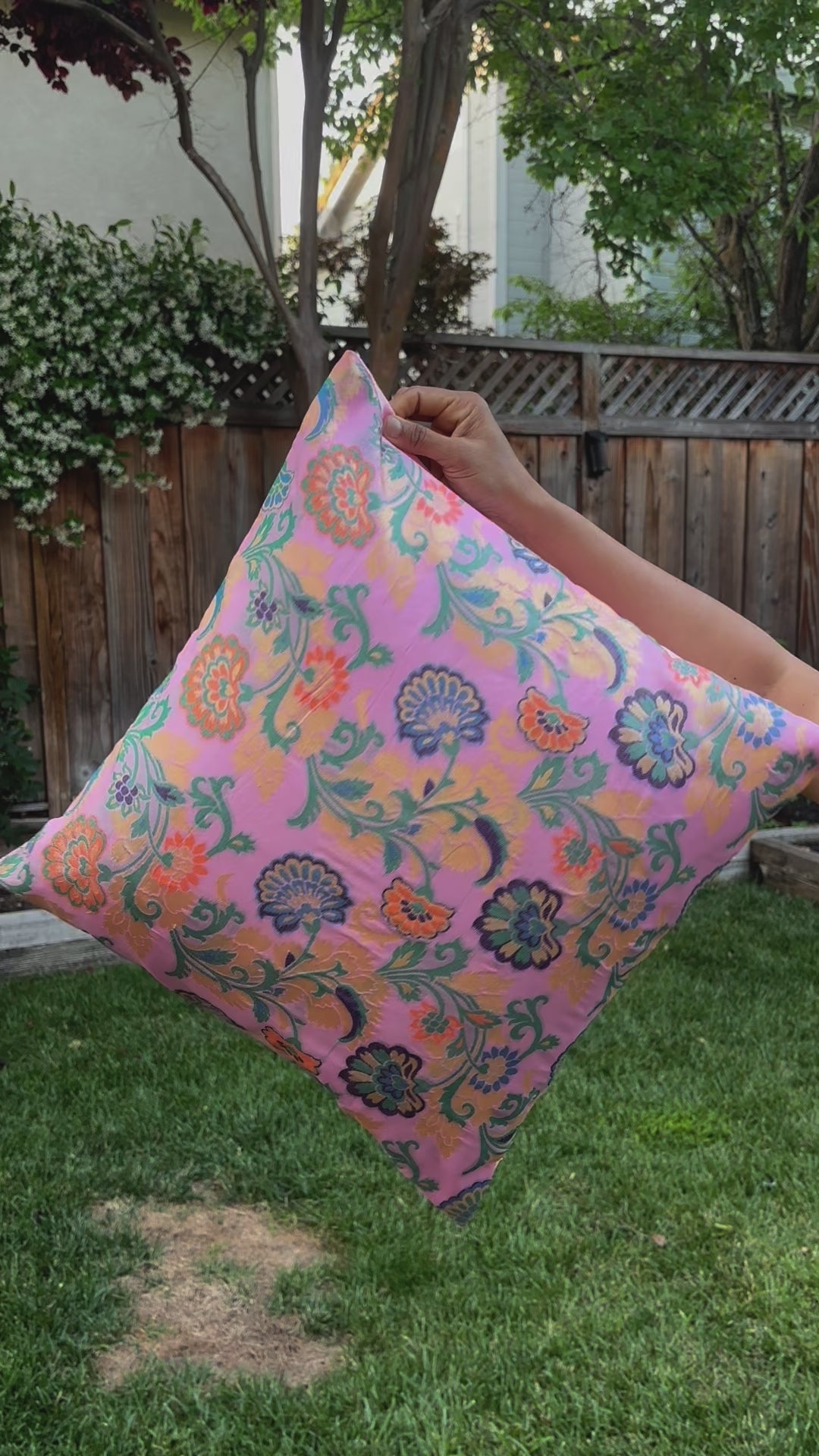 video show casing Stack of 5 premium silk brocade floral cushion covers, showcasing fabric quality and vibrant colors