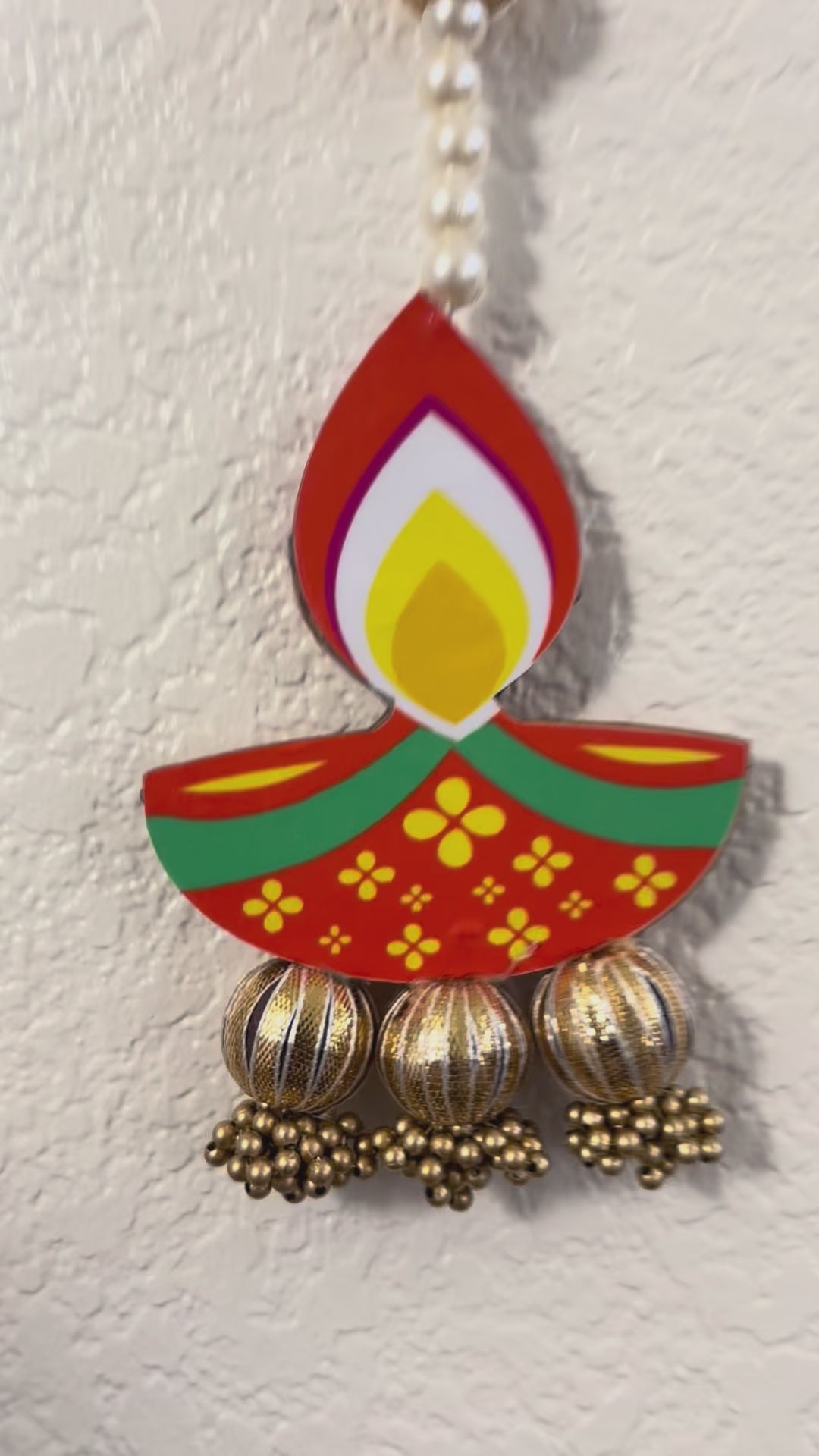 video of Lotus & Diya Backdrop Hanging Strings