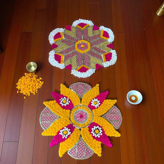 Two MDF rangoli designs side by side on wooden floor - An overhead shot of the rangoli set, showing the intricate Suzani-style embroidery and colorful beads.