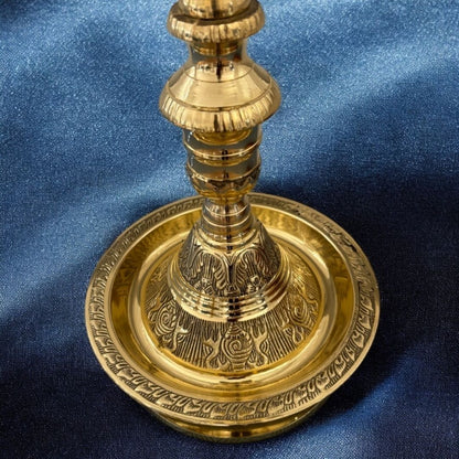 Close-up of the brass Mahabharat Diya, highlighting detailed craftsmanship; a quintessential Indian lamp for pooja and festive 2025 celebrations