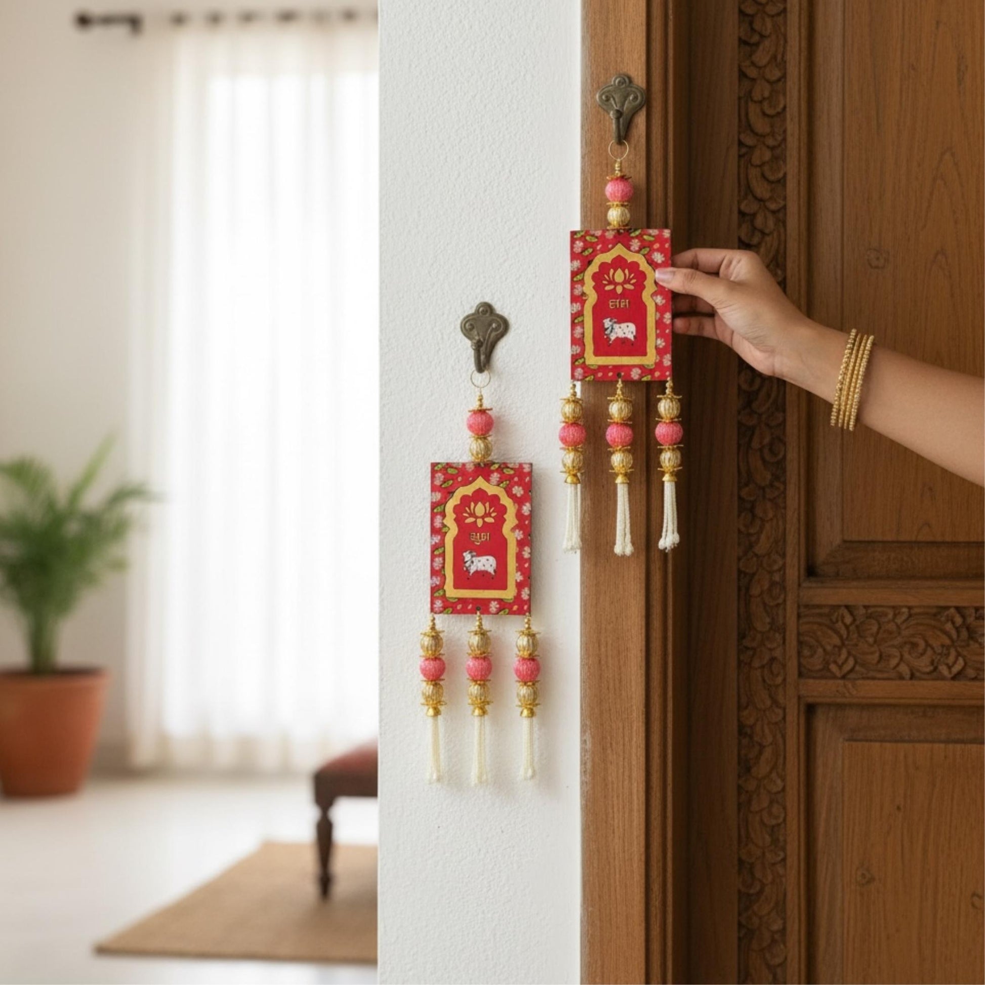 Handcrafted Shubh Labh hanging set displayed on a decorative door — traditional Indian Diwali decor