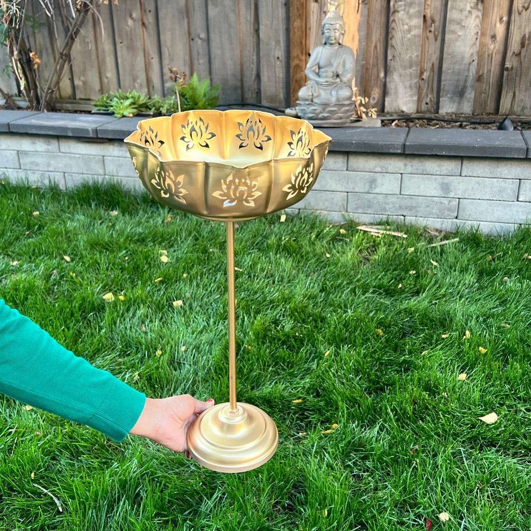 Single Gold Lotus Motif Urli by Urli Utsav Decor — standing bowl held to show scale and height (ideal for Diwali & wedding decor)