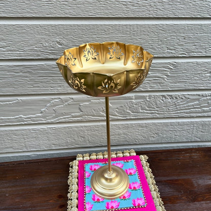 Single Gold Lotus Motif Urli by Urli Utsav Decor styled on decorative mat — ideal indoor puja, tabletop centerpiece for festivals